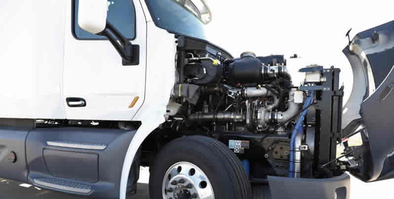 photo of semi truck with hood open
